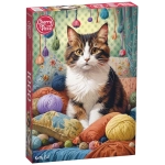 Niedliche Katze mit Wollknäuel