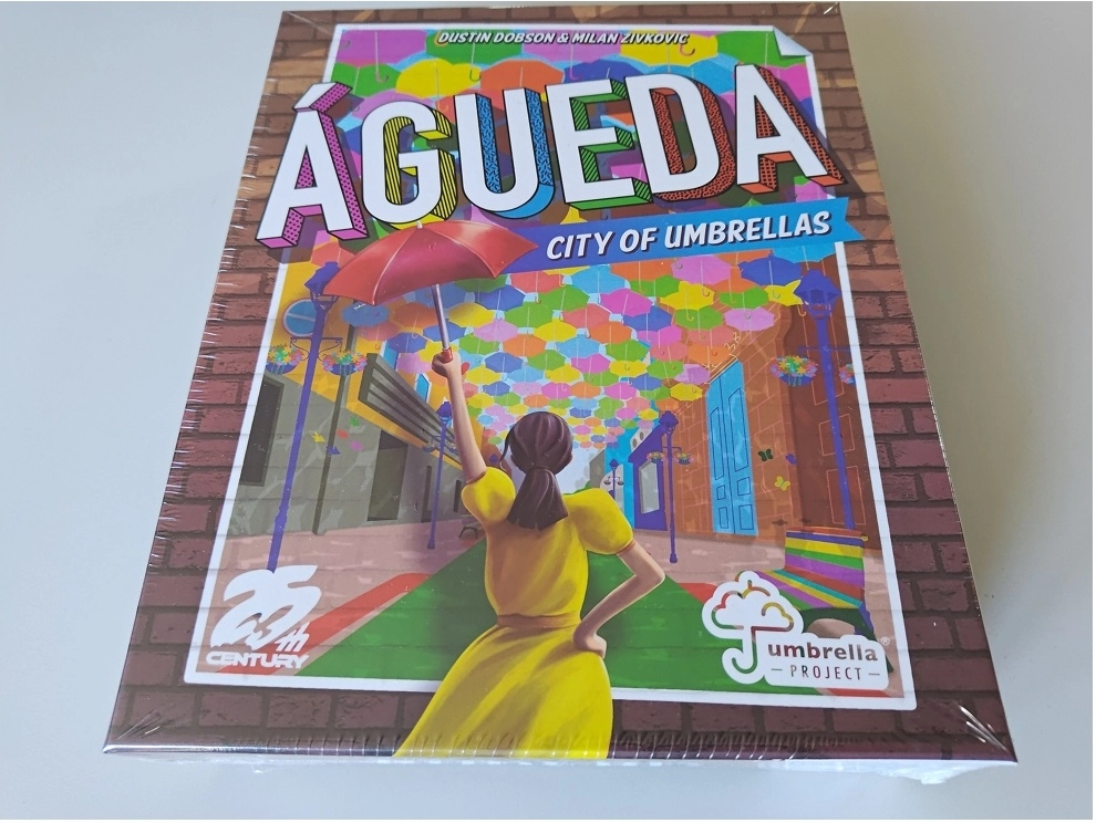 Agueda: City of Umbrellas - EN (Defekte Verpackung)