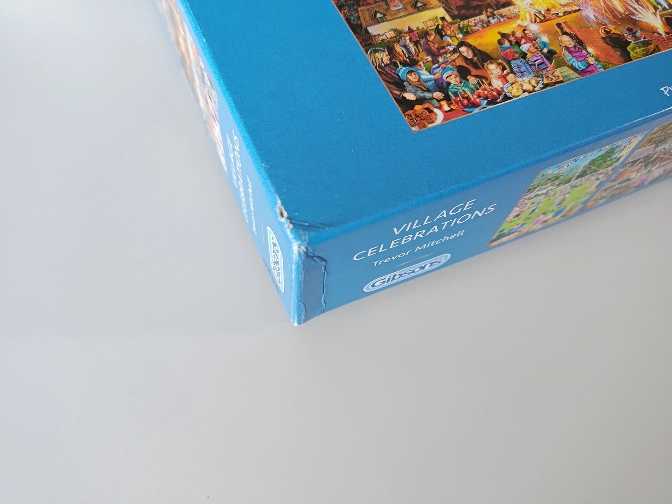 Village Celebrations -  Trevor Mitchell - 4x 500 Teile Puzzle (Leicht defekte Verpackung)