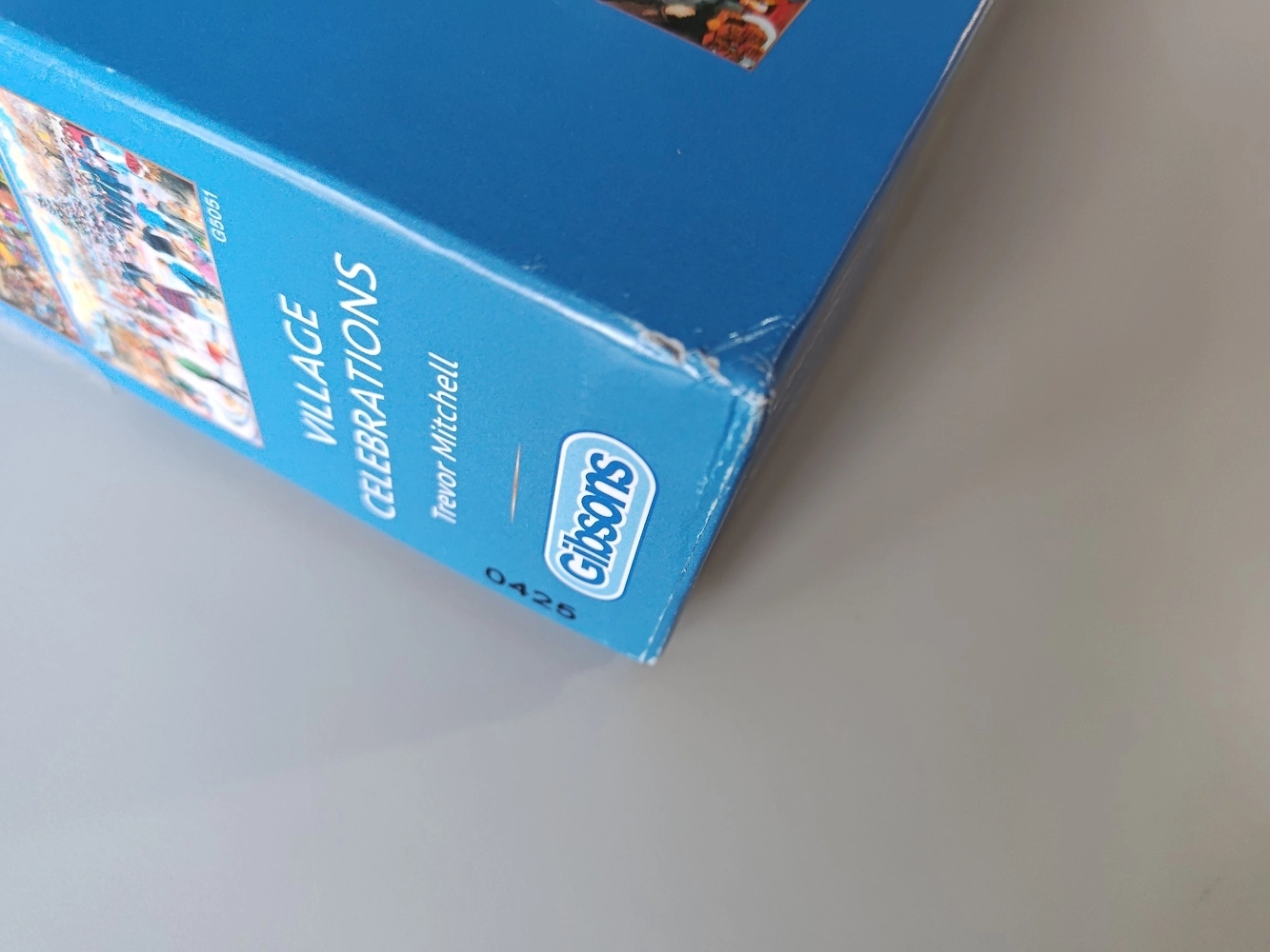 Village Celebrations -  Trevor Mitchell - 4x 500 Teile Puzzle (Leicht defekte Verpackung)