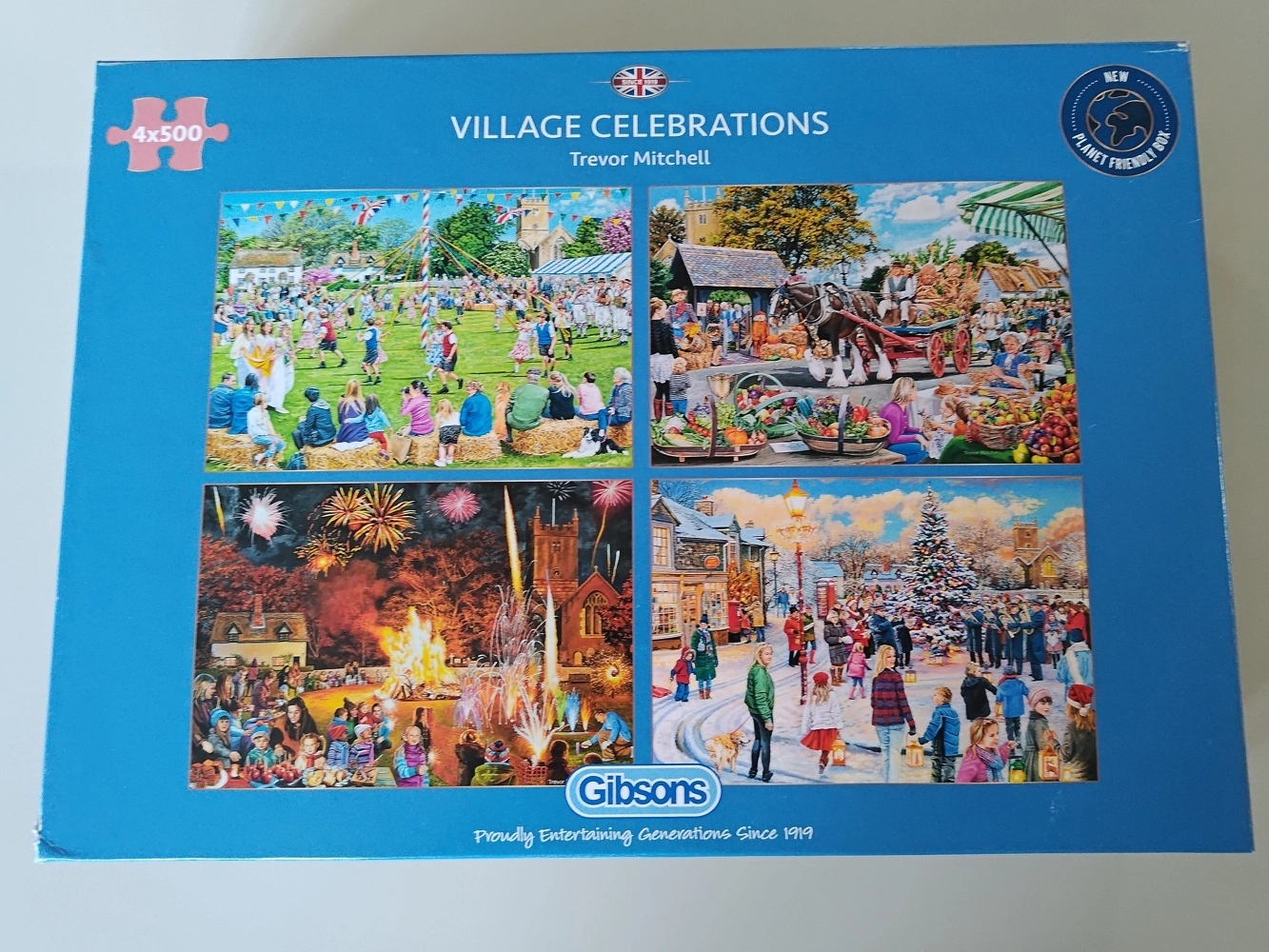 Village Celebrations -  Trevor Mitchell - 4x 500 Teile Puzzle (Leicht defekte Verpackung)