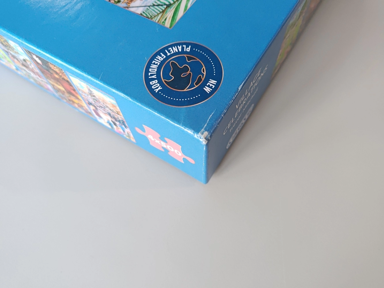 Village Celebrations -  Trevor Mitchell - 4x 500 Teile Puzzle (Leicht defekte Verpackung)