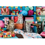 Kätzchen im Nähzimmer