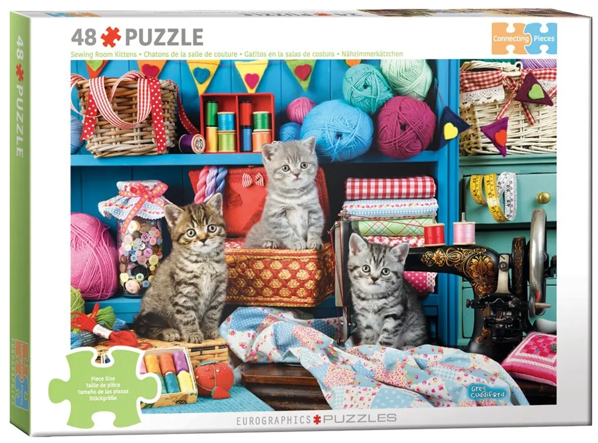 Kätzchen im Nähzimmer